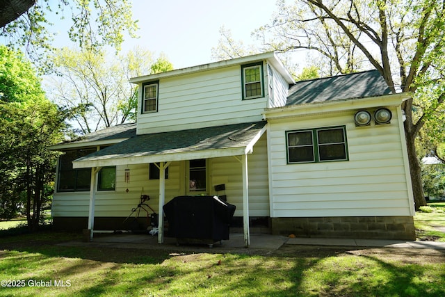 31 Thomas Ave, Hudson Falls, NY 12839 - rear view of property with a shingled roof and a lawn