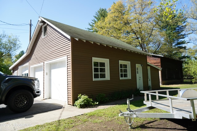 31 Thomas Ave, Hudson Falls, NY 12839 - view of property exterior with a garage