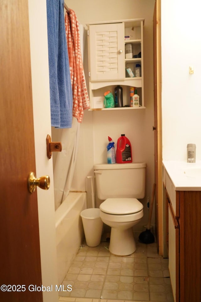 31 Thomas Ave, Hudson Falls, NY 12839 - bathroom featuring vanity, toilet, and shower / bath combo with shower curtain