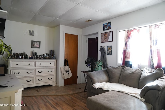 31 Thomas Ave, Hudson Falls, NY 12839 - living room featuring a paneled ceiling and dark wood-style flooring