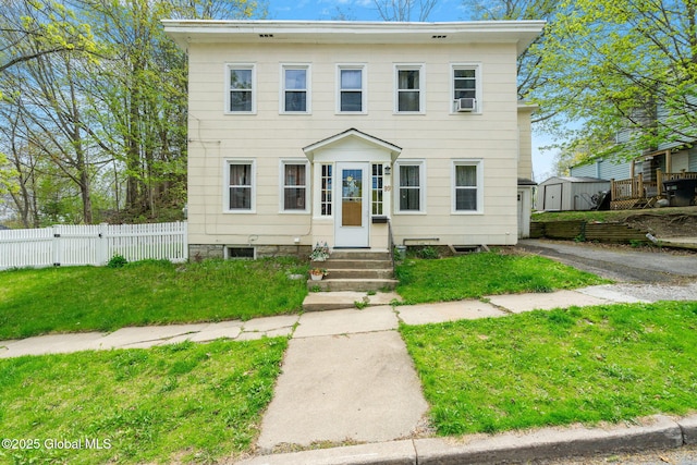 99 Otsego St, Canajoharie, NY 13317 - view of front facade featuring a storage shed, an outbuilding, and cooling unit