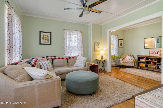 99 Otsego St, Canajoharie, NY 13317 - living room featuring wood finished floors and ceiling fan