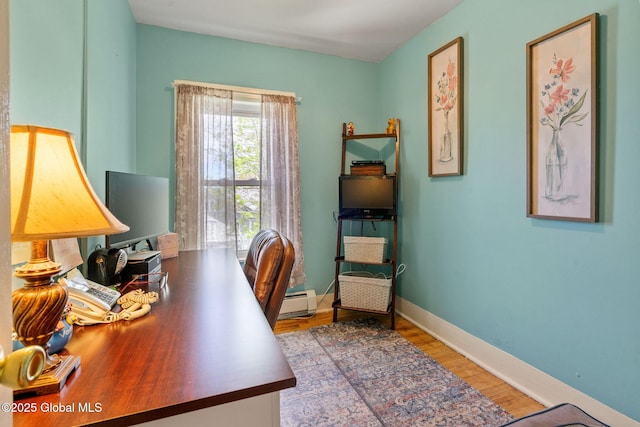 99 Otsego St, Canajoharie, NY 13317 - office with baseboard heating, wood finished floors, and baseboards