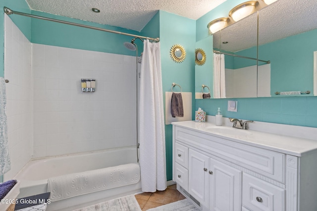 99 Otsego St, Canajoharie, NY 13317 - bathroom featuring a textured ceiling, shower / bath combo, tile patterned flooring, and vanity