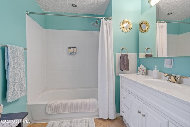 99 Otsego St, Canajoharie, NY 13317 - bathroom with a textured ceiling, shower / bath combo with shower curtain, vanity, and tile patterned floors