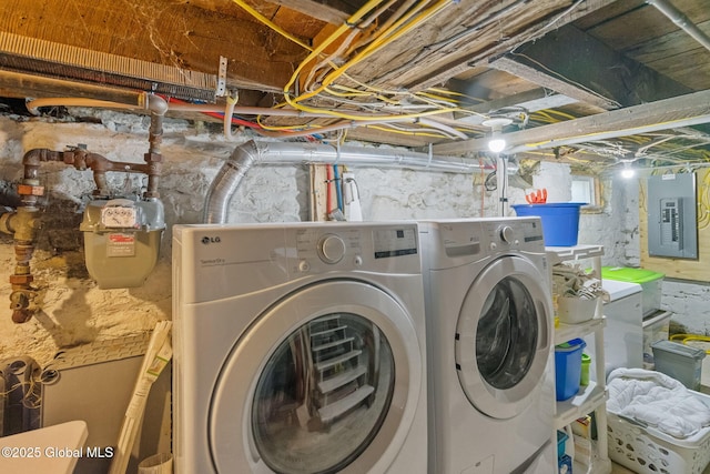 99 Otsego St, Canajoharie, NY 13317 - clothes washing area featuring separate washer and dryer and electric panel