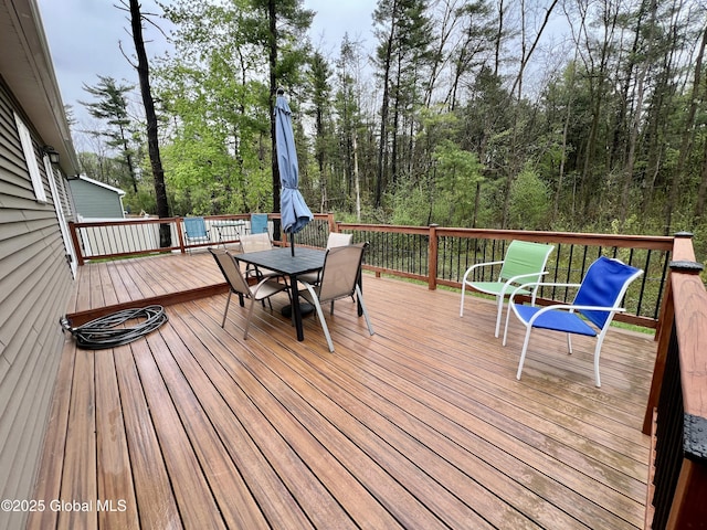 deck featuring outdoor dining space