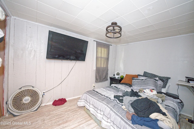 17-19 Smith Ct, North Greenbush, NY 12198 - bedroom featuring wood finished floors, baseboards, and wood walls