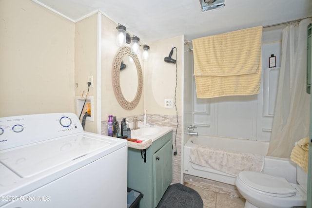 17-19 Smith Ct, North Greenbush, NY 12198 - bathroom with washer / dryer, vanity, tile patterned floors, toilet, and shower / bath combination with curtain