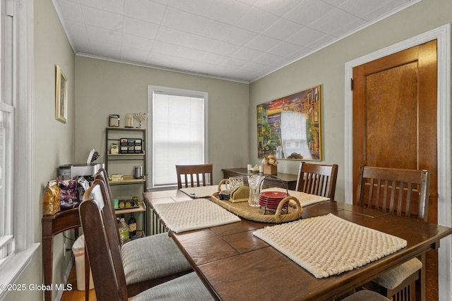 dining room with ornamental molding