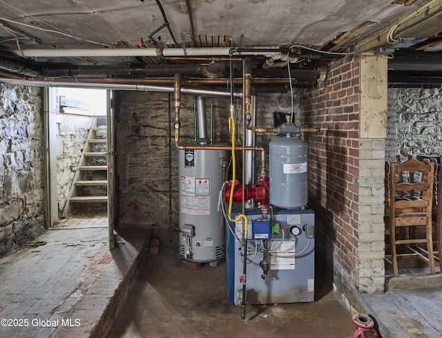 unfinished below grade area featuring gas water heater and a heating unit