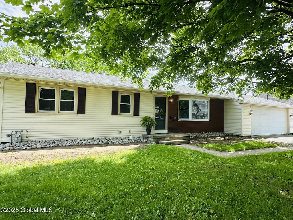 14 James Ct, Glens Falls, NY 12801 - ranch-style home with a garage, a front yard, and a shingled roof
