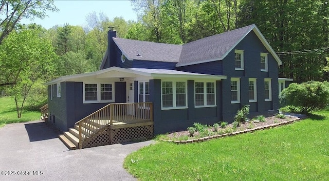 96 W Deans Mill Rd, New Baltimore, NY 12192 - view of front of property featuring a chimney, a shingled roof, and a front lawn