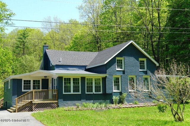 96 W Deans Mill Rd, New Baltimore, NY 12192 - rear view of house featuring a chimney, a lawn, and a shingled roof
