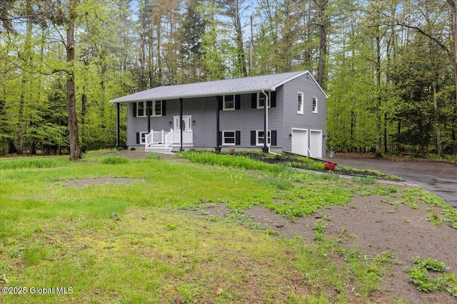 292 Stone Church Rd, Ballston Spa, NY 12020 - raised ranch with a garage and asphalt driveway