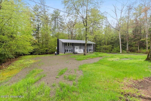 292 Stone Church Rd, Ballston Spa, NY 12020 - view of front of home featuring a forest view and a porch