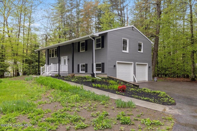 292 Stone Church Rd, Ballston Spa, NY 12020 - raised ranch with driveway and an attached garage
