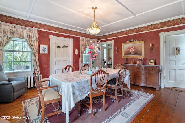 12098 Duanesburg Rd, Duanesburg, NY 12053 - dining area with radiator, hardwood / wood-style floors, a chandelier, wallpapered walls, and crown molding