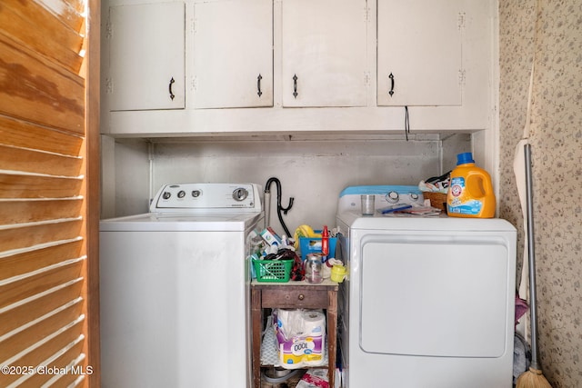 12098 Duanesburg Rd, Duanesburg, NY 12053 - laundry area featuring cabinet space, separate washer and dryer, and wallpapered walls