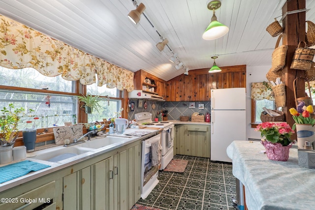 12098 Duanesburg Rd, Duanesburg, NY 12053 - kitchen featuring white appliances, track lighting, light countertops, dark floors, and green cabinets