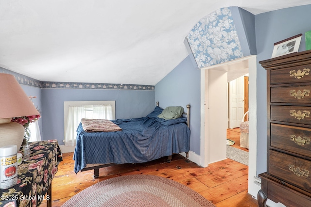 12098 Duanesburg Rd, Duanesburg, NY 12053 - bedroom featuring hardwood / wood-style floors and vaulted ceiling