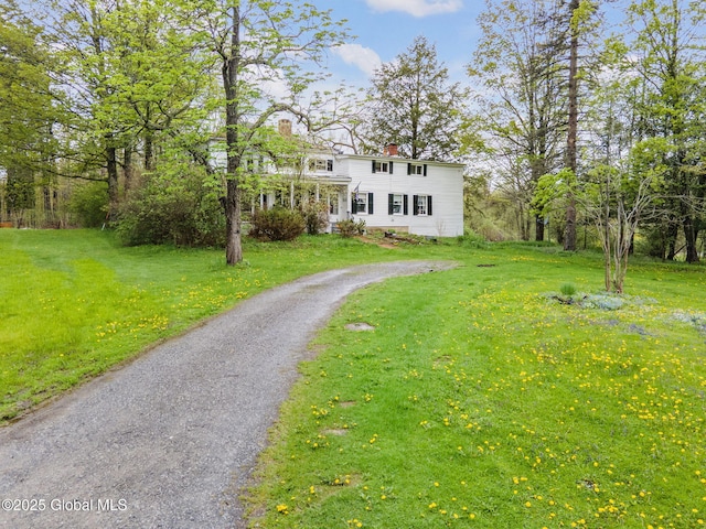12098 Duanesburg Rd, Duanesburg, NY 12053 - view of front facade with a chimney, a front yard, and driveway