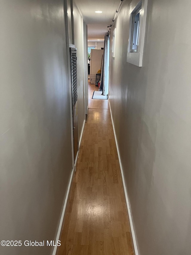 434 Old Stage Rd, Lake Luzerne, NY 12846 - hallway featuring wood finished floors, baseboards, and electric panel