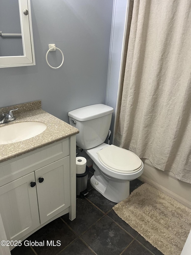 434 Old Stage Rd, Lake Luzerne, NY 12846 - bathroom with tile patterned floors, toilet, and vanity
