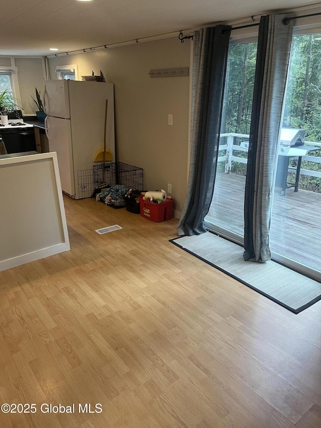 434 Old Stage Rd, Lake Luzerne, NY 12846 - unfurnished dining area with light wood-style floors and plenty of natural light