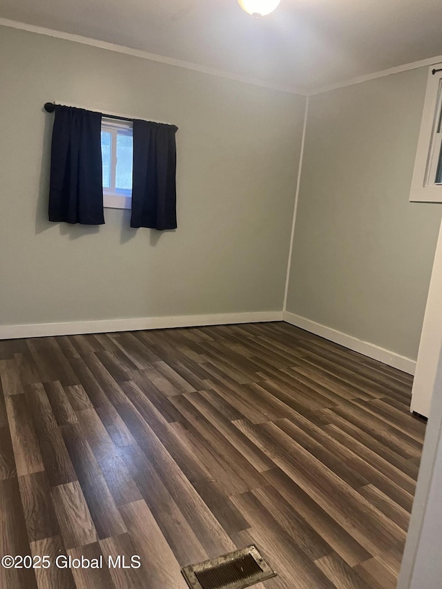 434 Old Stage Rd, Lake Luzerne, NY 12846 - empty room featuring baseboards, dark wood-style flooring, and crown molding