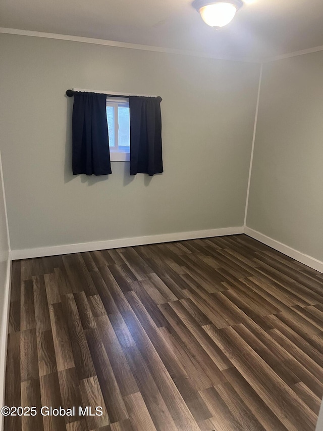 434 Old Stage Rd, Lake Luzerne, NY 12846 - empty room with crown molding, baseboards, and dark wood finished floors
