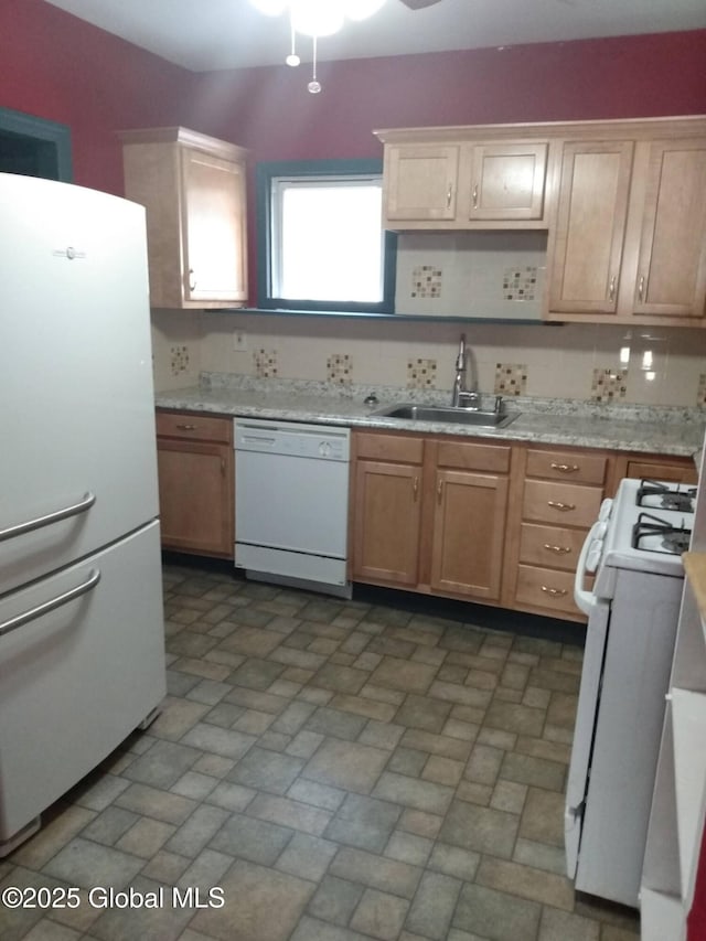 kitchen with white appliances, a sink, light countertops, brick patterned floors, and ceiling fan