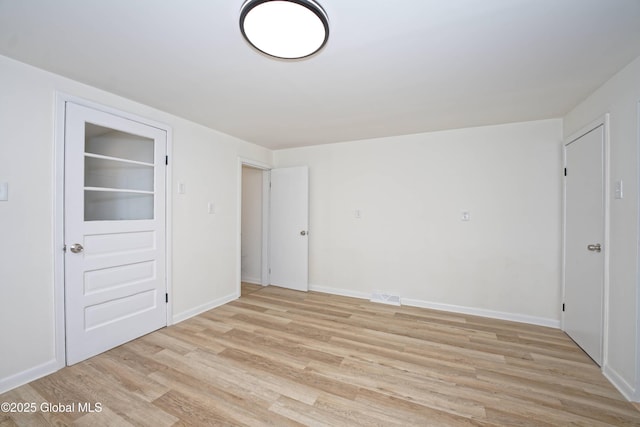 30 Andrewsville Ct, Watervliet, NY 12189 - empty room with light wood-style flooring and baseboards