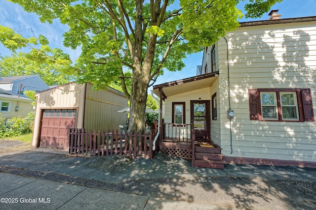 30 Andrewsville Ct, Watervliet, NY 12189 - view of front of home featuring an outdoor structure and a detached garage