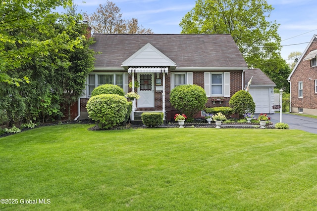 2125 Ferguson St, Rotterdam, NY 12303 - view of front of house with brick siding, a front lawn, and a chimney
