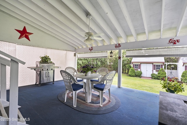2125 Ferguson St, Rotterdam, NY 12303 - view of patio / terrace featuring ceiling fan, outdoor dining space, an outdoor structure, grilling area, and a shed