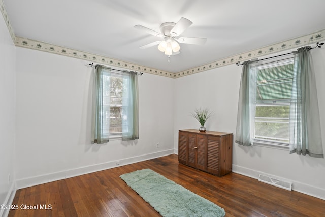 2125 Ferguson St, Rotterdam, NY 12303 - spare room with baseboards, hardwood / wood-style floors, and ceiling fan