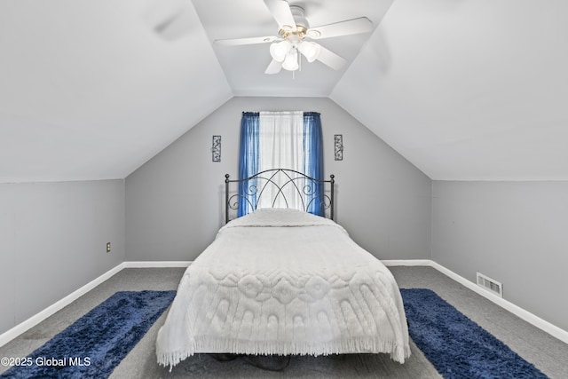 2125 Ferguson St, Rotterdam, NY 12303 - carpeted bedroom with vaulted ceiling, baseboards, and ceiling fan