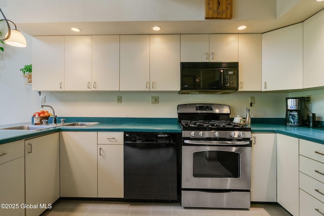 kitchen featuring black appliances, a sink, white cabinetry, and recessed lighting
