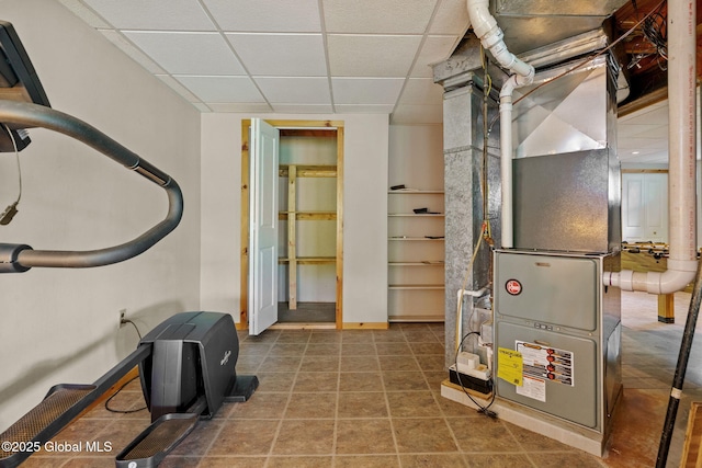 utility room with heating unit