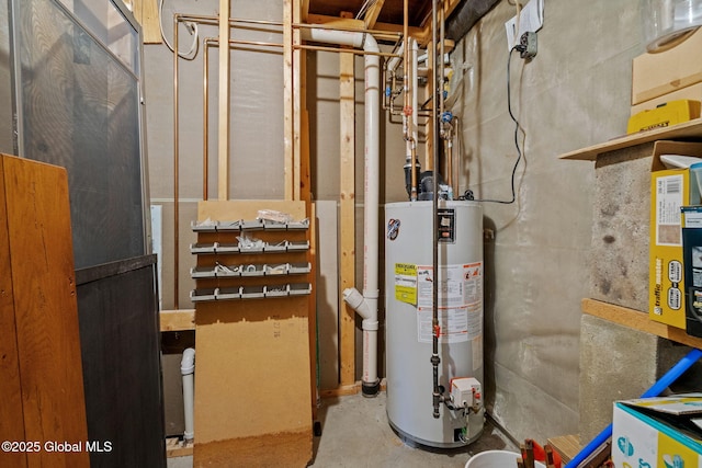 utility room featuring water heater