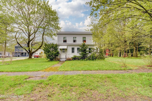 view of front of home with a front yard