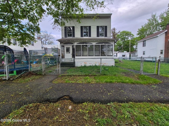 1220 5th Ave, Watervliet, NY 12189 - view of front of home featuring a gate and a sunroom