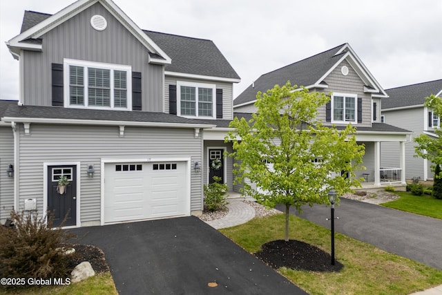 19 Pasture Pl, Ballston, NY 12019 - view of front of home featuring a garage, driveway, board and batten siding, and a shingled roof