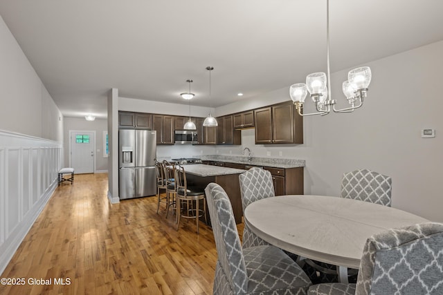 19 Pasture Pl, Ballston, NY 12019 - dining area featuring light wood-style floors and a chandelier