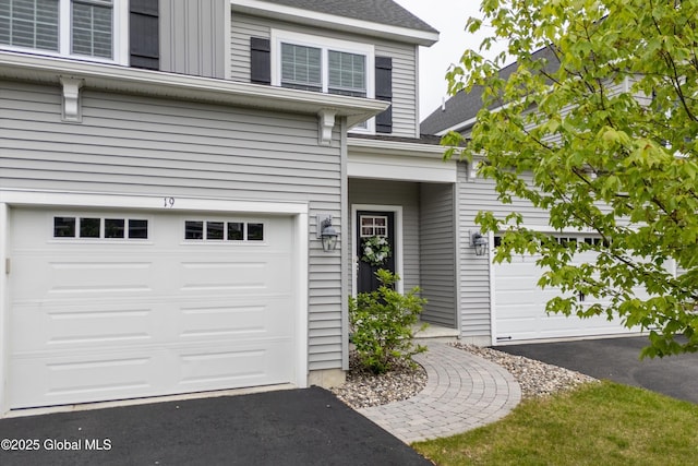 19 Pasture Pl, Ballston, NY 12019 - view of front of property featuring driveway, a garage, and roof with shingles