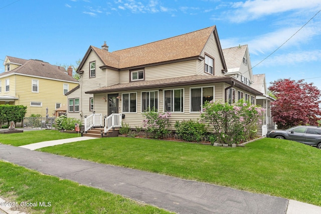 1841 Lenox Rd, Schenectady, NY 12308 - view of front facade featuring a front lawn, roof with shingles, and a chimney