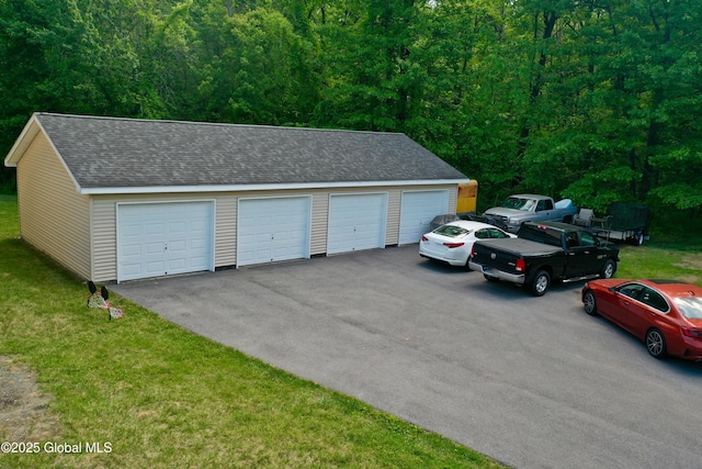 15 Fellows Rd, Halfmoon, NY 12065 - garage featuring a wooded view