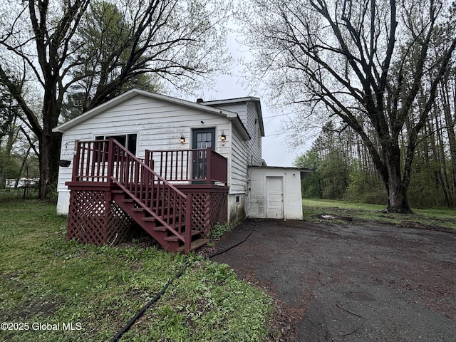 162 State Highway 67, Ephratah, NY 13339 - rear view of property featuring stairway and a wooden deck