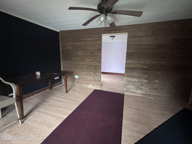 162 State Highway 67, Ephratah, NY 13339 - living room featuring ceiling fan, wood finished floors, and wooden walls